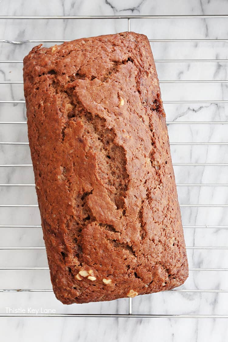 Bread on cooling rack. Spiced Applesauce Bread Recipe.