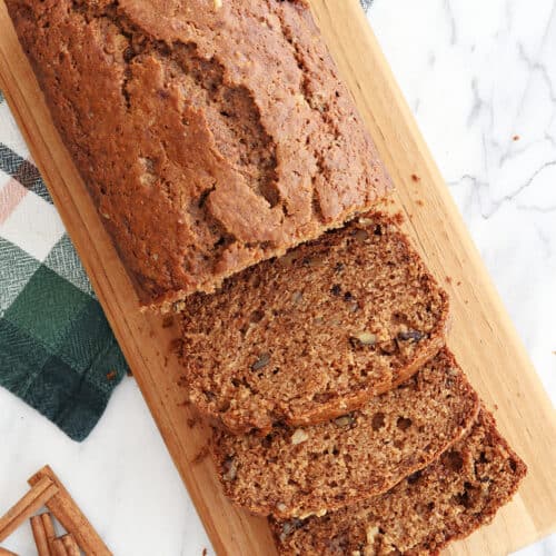 Sliced bread on board. Spiced Applesauce Bread Recipe.